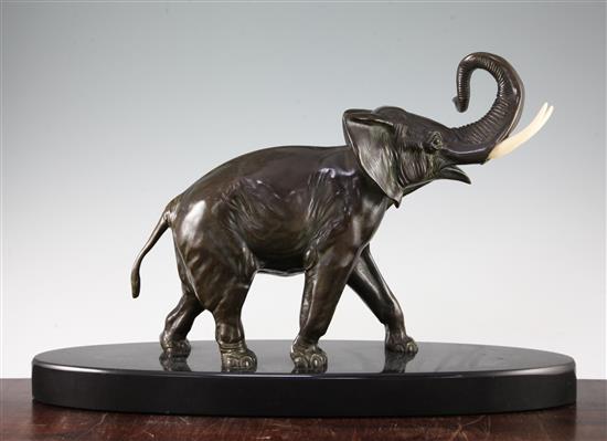 A French Art Deco patinated bronze model of a elephant, 23in.